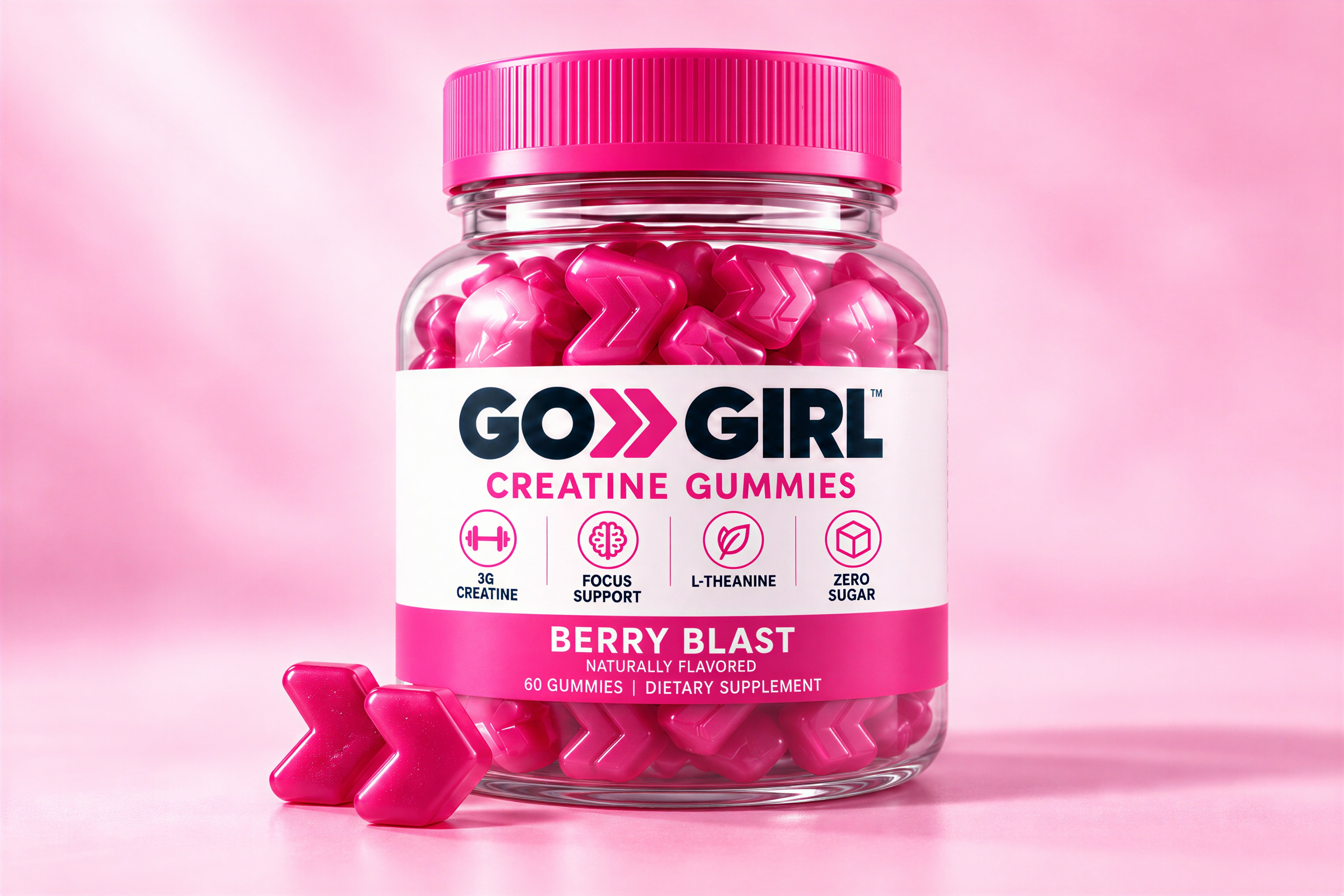 Go Girl product concept: a Berry Blast creatine gummies jar with a pink cap and two chevron-shaped gummies